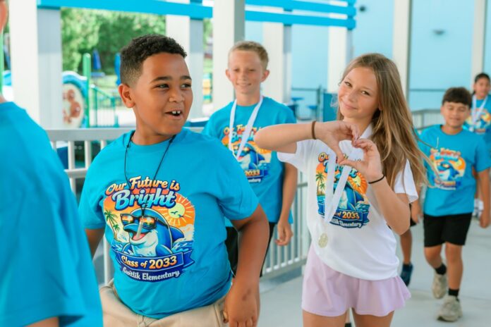 IN PICTURES: DOLPHINS SWIM ON AFTER SWITLIK MOVING UP CEREMONY